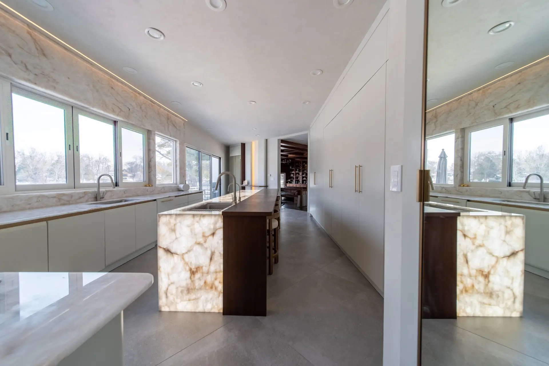 Close-up of real Crystalo quartzite island panel in a luxury custom kitchen by Americana Studio